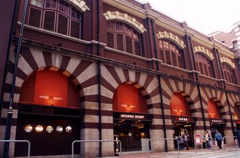 Combination use of red bricks and granite band for exuberantly classical facades with elegant venation windows.