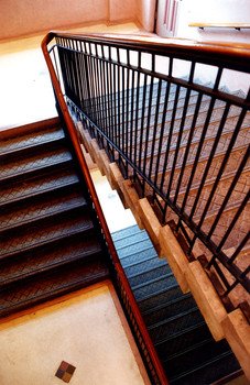 Beautiful design of the large local quarried granite steps to the corner staircase tower.